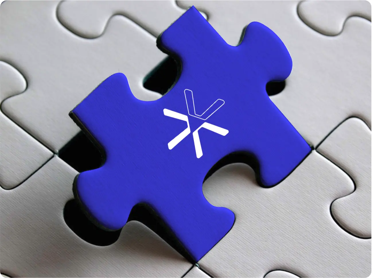 Blue puzzle piece with GuidanceAI logo